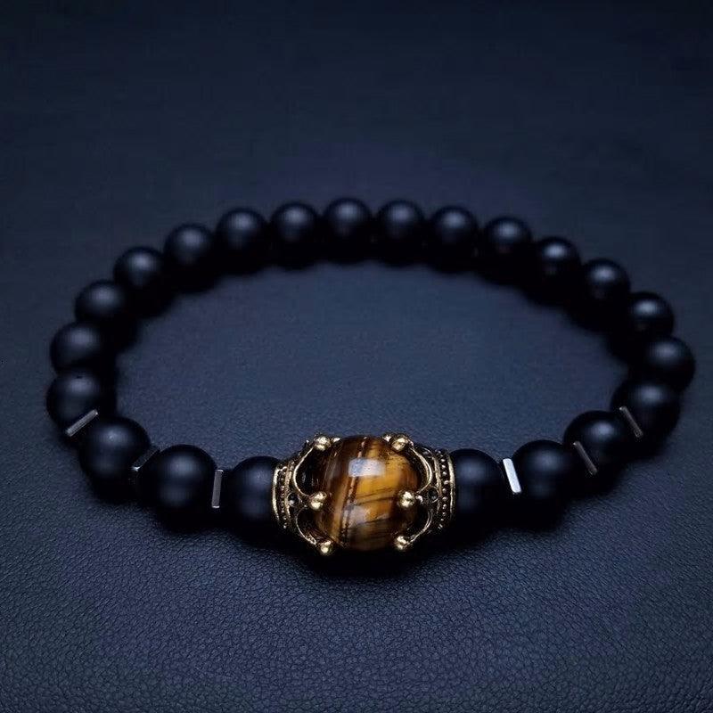 Bracelet force en onyx et oeil de tigre.